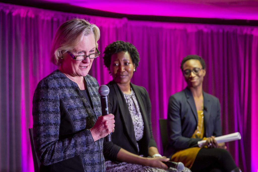 Dr. Julie Gralow speaks to attendees during the World Cancer Day Celebration, February 8, 2020, hosted by The Cierra Sisters at the Langston Hughes Performing Arts Center in Seattle, Washington. Other panelists are Dr. Rachel Issaka and Dr. Kemi Doll.