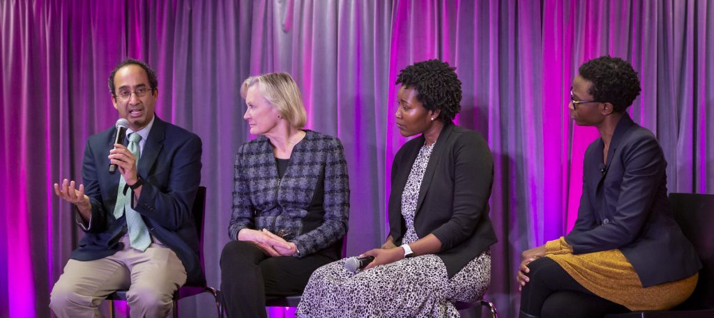 Dr. Menoj Menon speaks during the World Cancer Day Celebration, February 8, 2020, hosted by The Cierra Sisters at the Langston Hughes Performing Arts Center in Seattle, Washington. Other panelists include Dr. Julie Gralow, Dr. Rachel Issaka and Dr. Kemi Doll