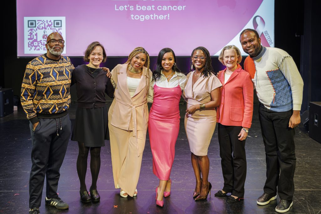 Bridgette Hempstead’s daughters Dee Scott and Shayla Akande pose others during the World Cancer Day event hosted by the Cierra Sisters, February 8, 2025, at the Langston Hughes Performing Arts Institute in Seattle, Washington. The Cierra Sisters is a Breast Cancer patient advocacy group that focuses on the struggles African-American women have while attempting to access cancer diagnosis, research and treatment.